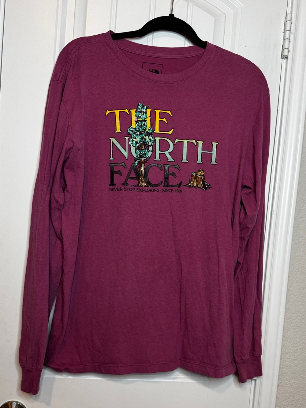 The North Face Men's Long Sleeve Tee in pink with Yellow Logo